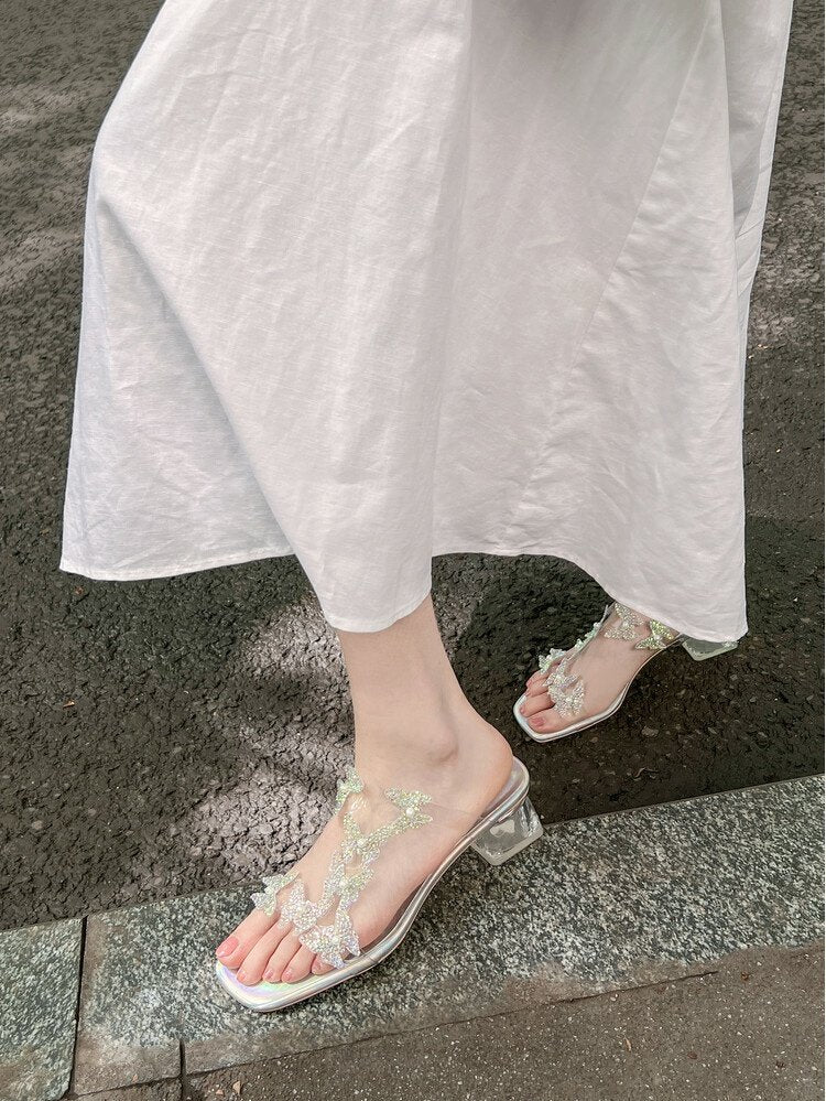 Lost in the Butterfly Valley! Exquisitely beautiful summer sandals with a fairy-like style, featuring blingy transparent butterfly crystal heels, perfect for wearing outdoors.