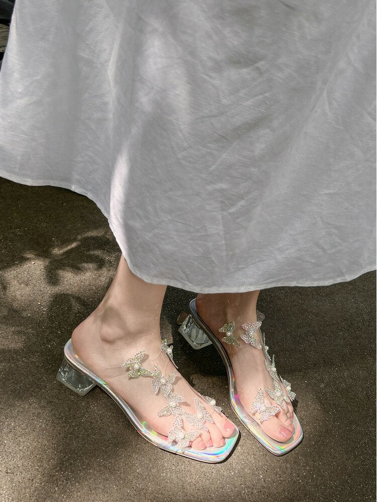 Lost in the Butterfly Valley! Exquisitely beautiful summer sandals with a fairy-like style, featuring blingy transparent butterfly crystal heels, perfect for wearing outdoors.